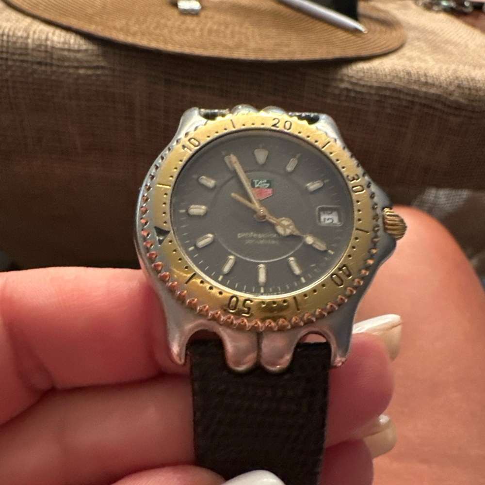 Tag Heuer Black and Gold Luxury Sport Watch